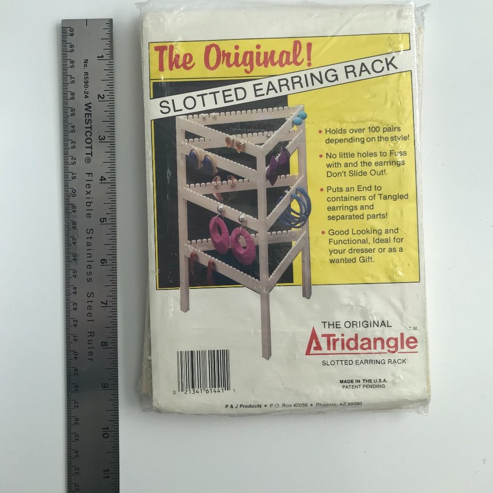 FREE with Purchase* - Slotted plastic Earring Rack- New in package